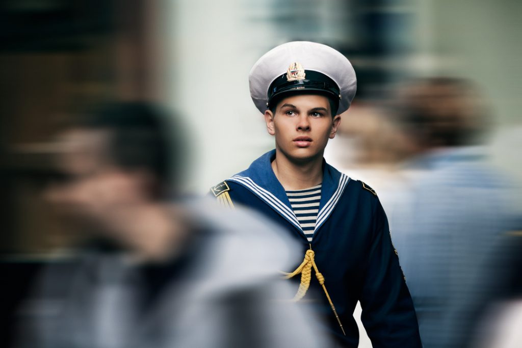 A young Russian sailor visiting the street of San Francisco downtown