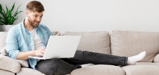man-on-couch-with-laptop_23-2148560419